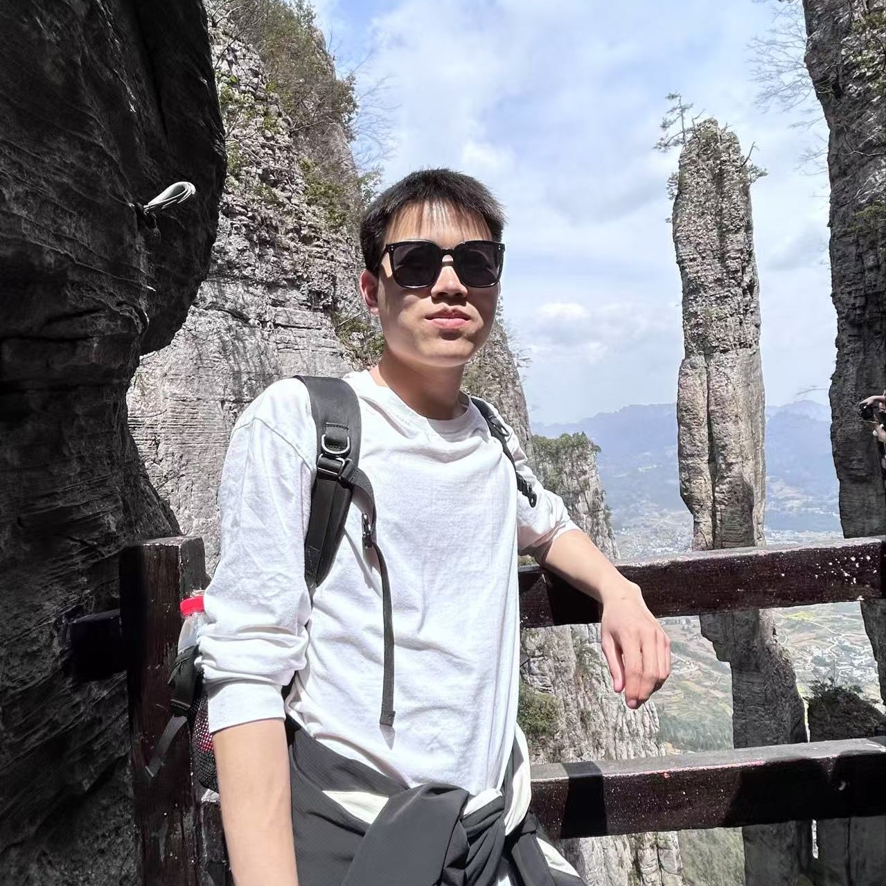 Yuxiang Tan